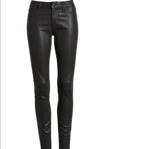 Articles of Society leather coated skinny jeans.
